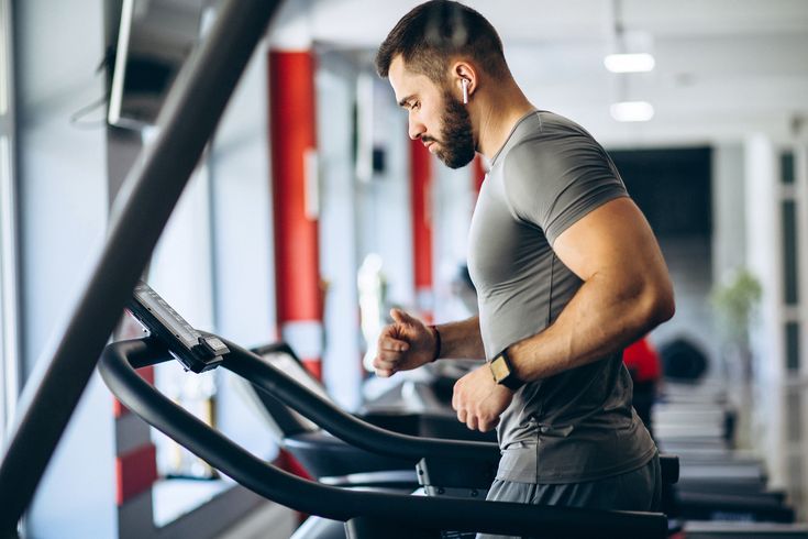 Strong man training in gym